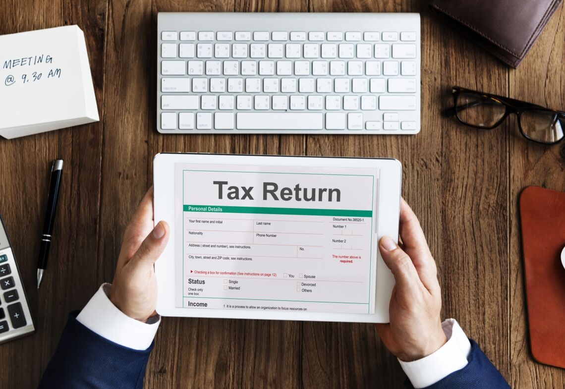 income tax return deduction refund concept 1 scaled Pinnacle Accounting & Advisory